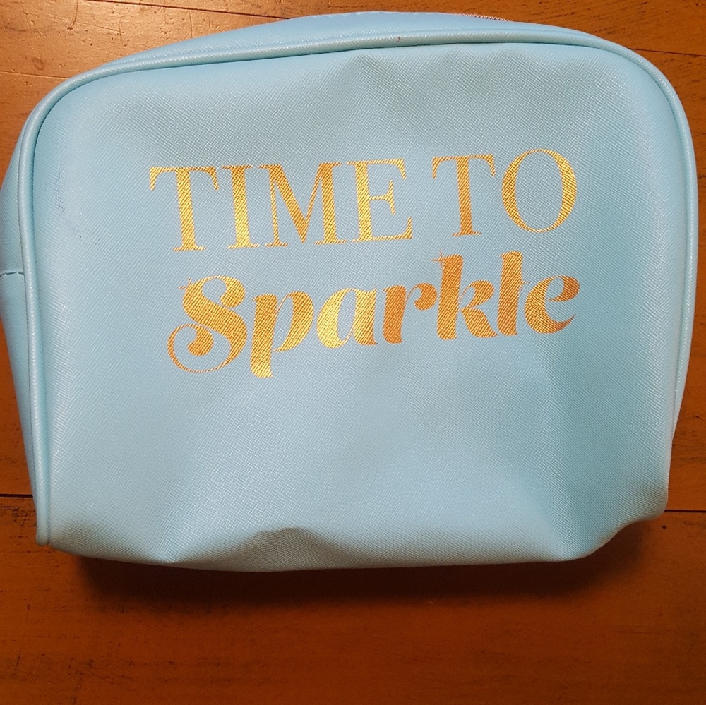 Turquoise makeup clutch